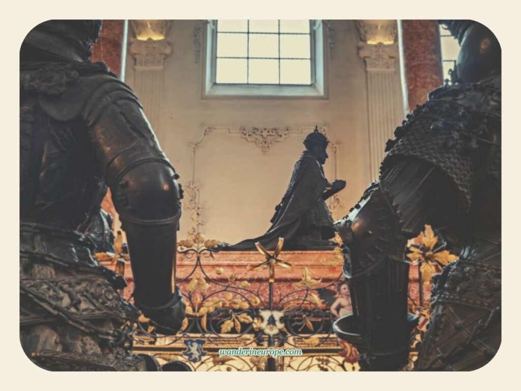 Inside Hofkirche (Court Church) — Innsbruck's Hidden Gem 13 The bronze sculpture of Maximilian I on top of his cenotaph in Court Church (Hofkirche) in Innsbruck, Austria