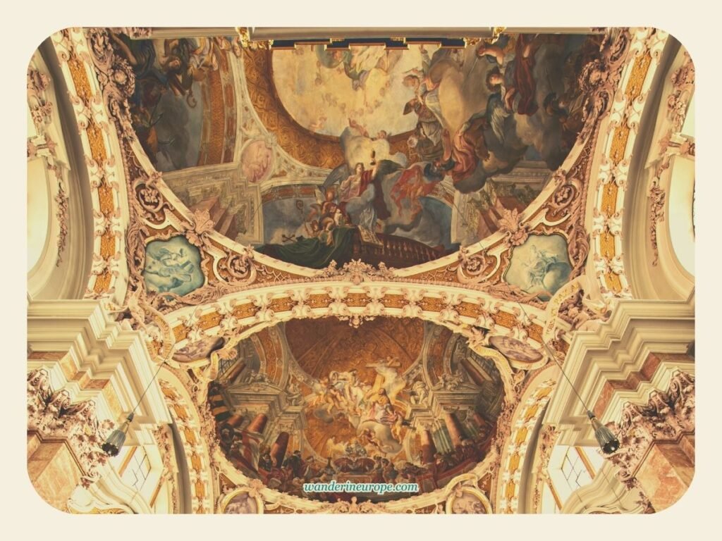 Innsbruck Cathedral and the 5 Beautiful Things Inside It 12 The first two of the three domes with cycle of frescoes by Damian Asam viewed from Innsbruck Cathedral's main portal, Innsbruck, Austria