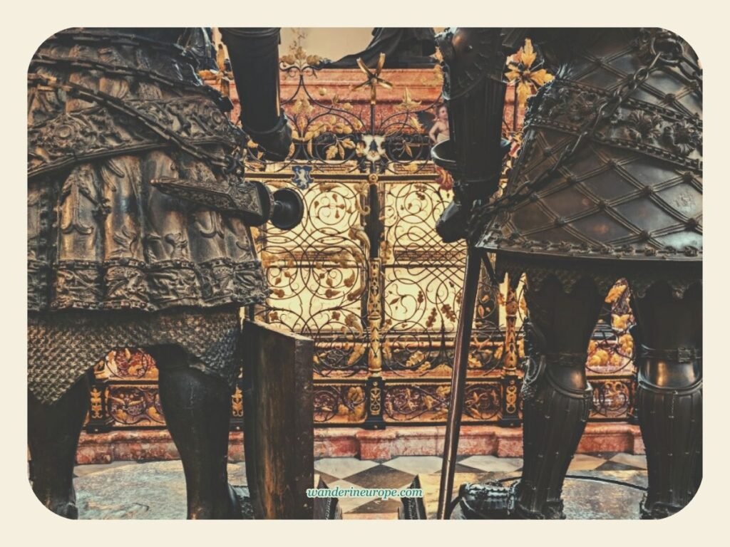 Inside Hofkirche (Court Church) — Innsbruck's Hidden Gem 11 View of Maximilian I's cenotaph in between two Black Men statues inside Court Church (Hofkirche) in Innsbruck, Austria