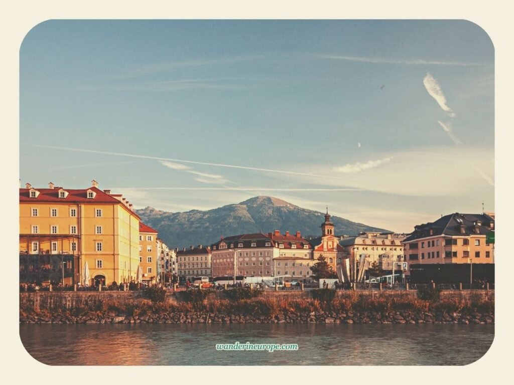 Spend 2 Days In Innsbruck, Austria (a Budget Itinerary) 28 Golden hour view of Marktplatz from the Colorful Houses of Innsbruck, a must-see place during a 2-day trip to Innsbruck, Austria