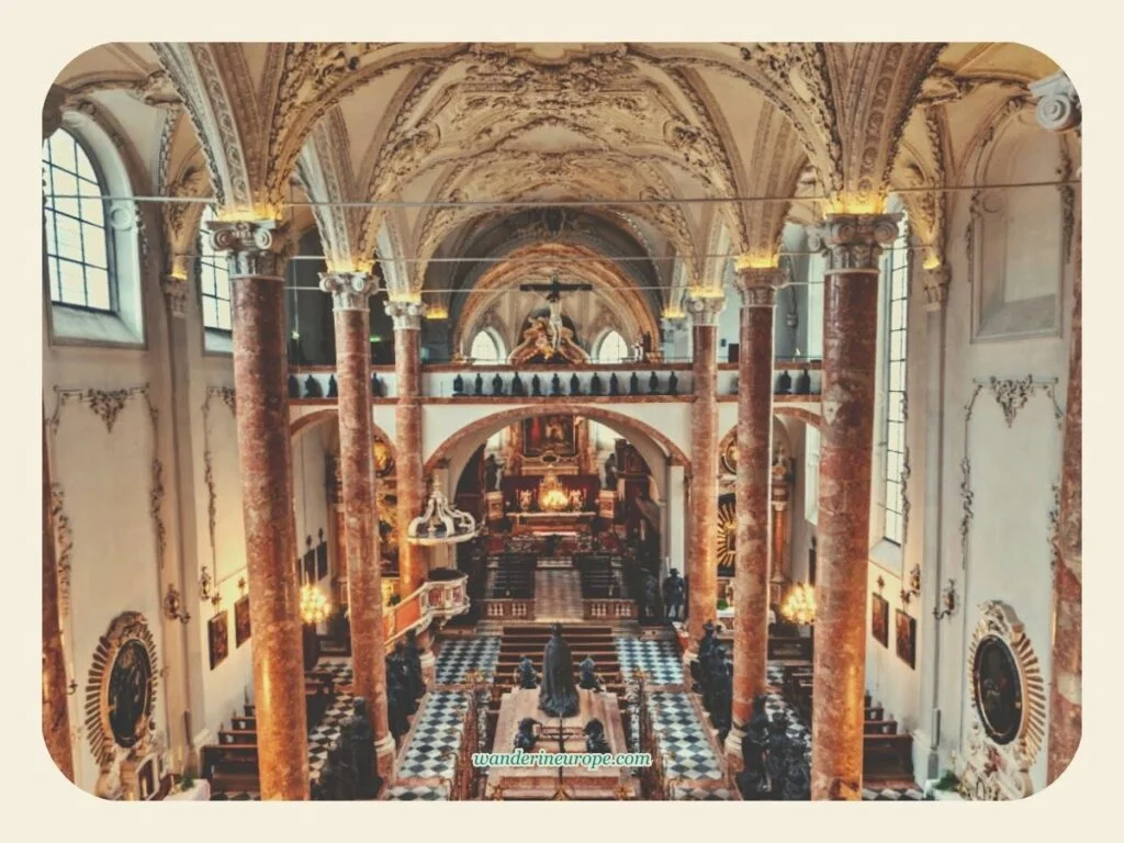 Inside Hofkirche, the cenotaph of Emperor Maximilian I and the statues of the Black Men to see on day 1 of 2-day trip to Innsbruck, Austria