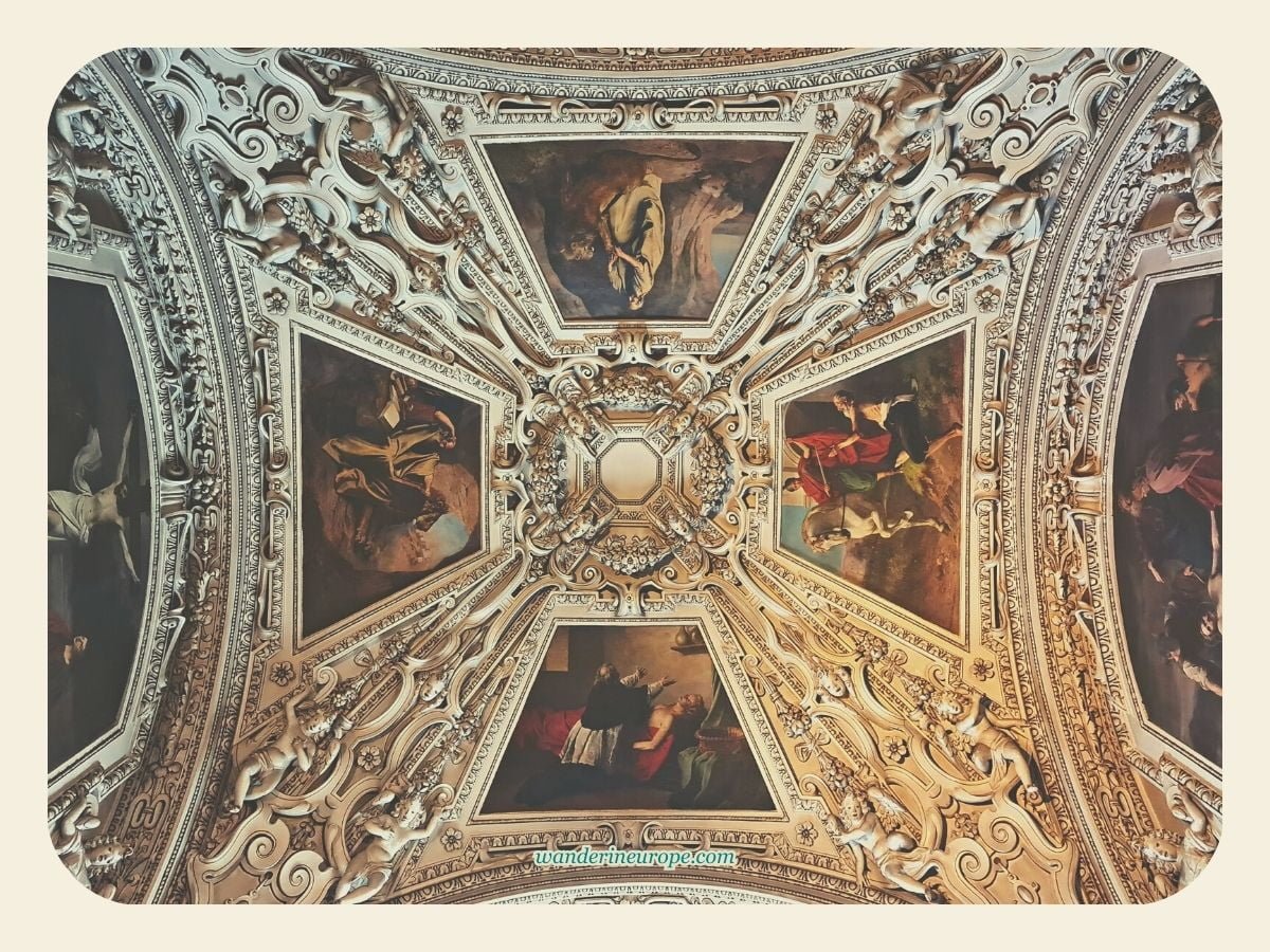Biblical scenes depicted by the frescoes, framed by the stuccos, in Salzburg, Austria