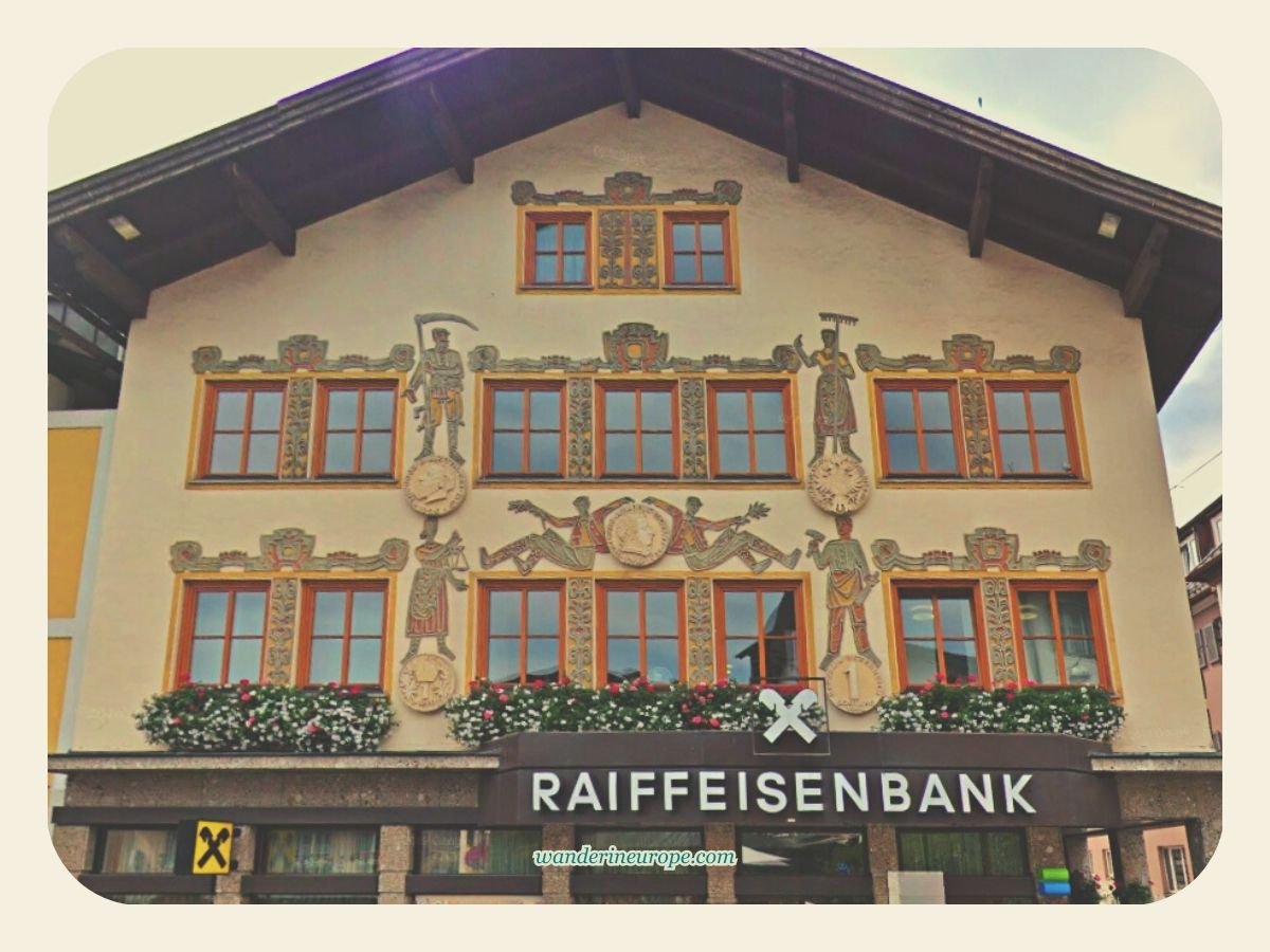 7 Attractions to See and Experience When Visiting St. Gilgen 14 Facade of Raiffeisenbank in Mozartplatz, St. Gilgen, Salzburg, Austria