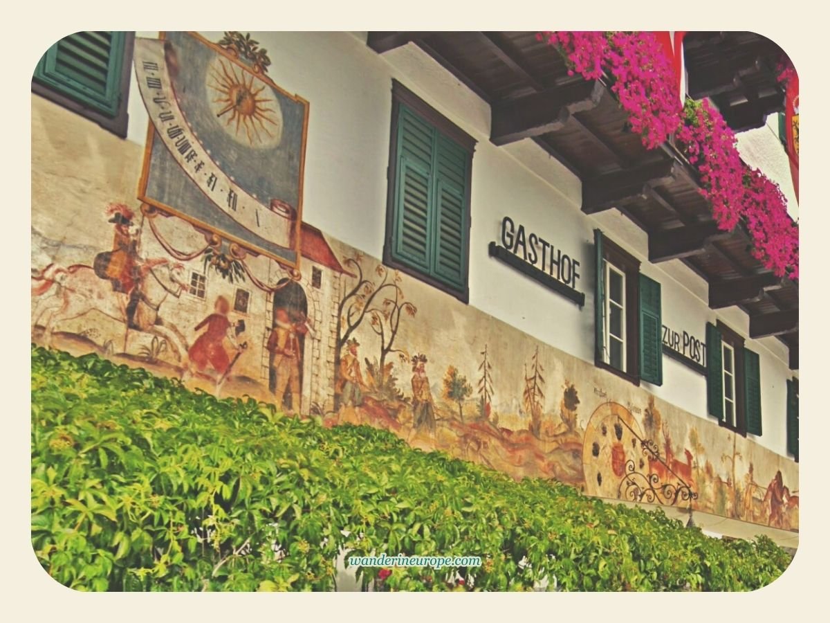 7 Attractions to See and Experience When Visiting St. Gilgen 13 Gasthof zur Post murals in Mozartplatz, St. Gilgen, Salzburg, Austria