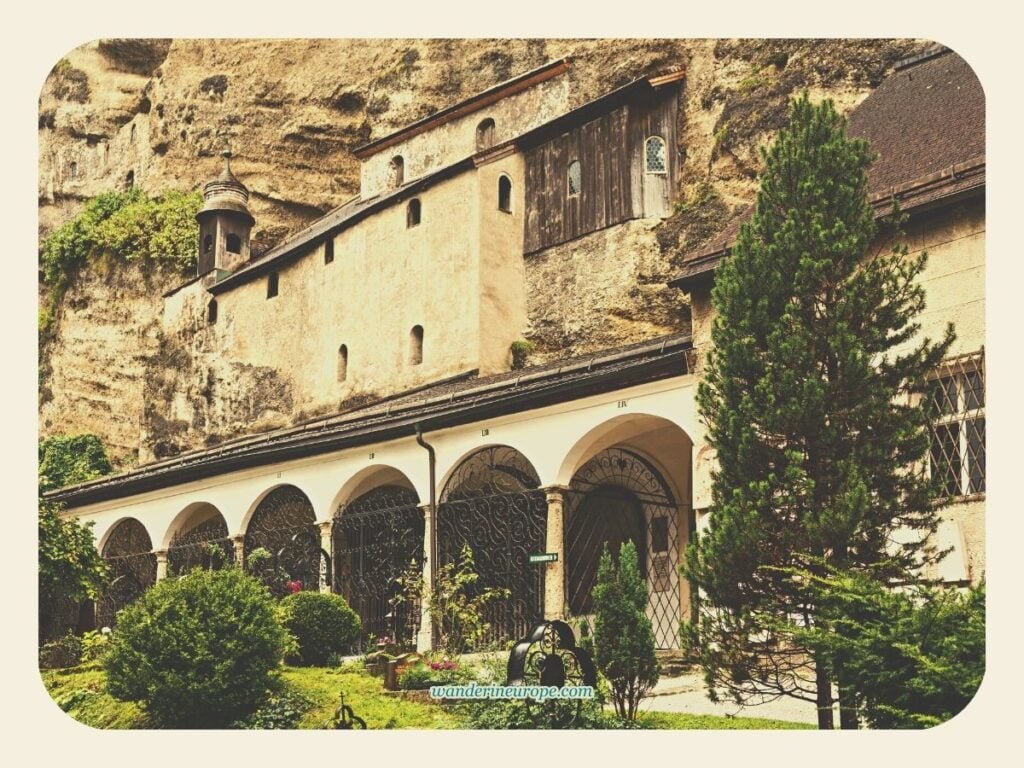 A Guide to Mönchsberg, Salzburg (Going There & Things to Do) 16 Outside Saint Peter's Catacomb carved into Mönchsberg's mountain face, Salzburg, Austria