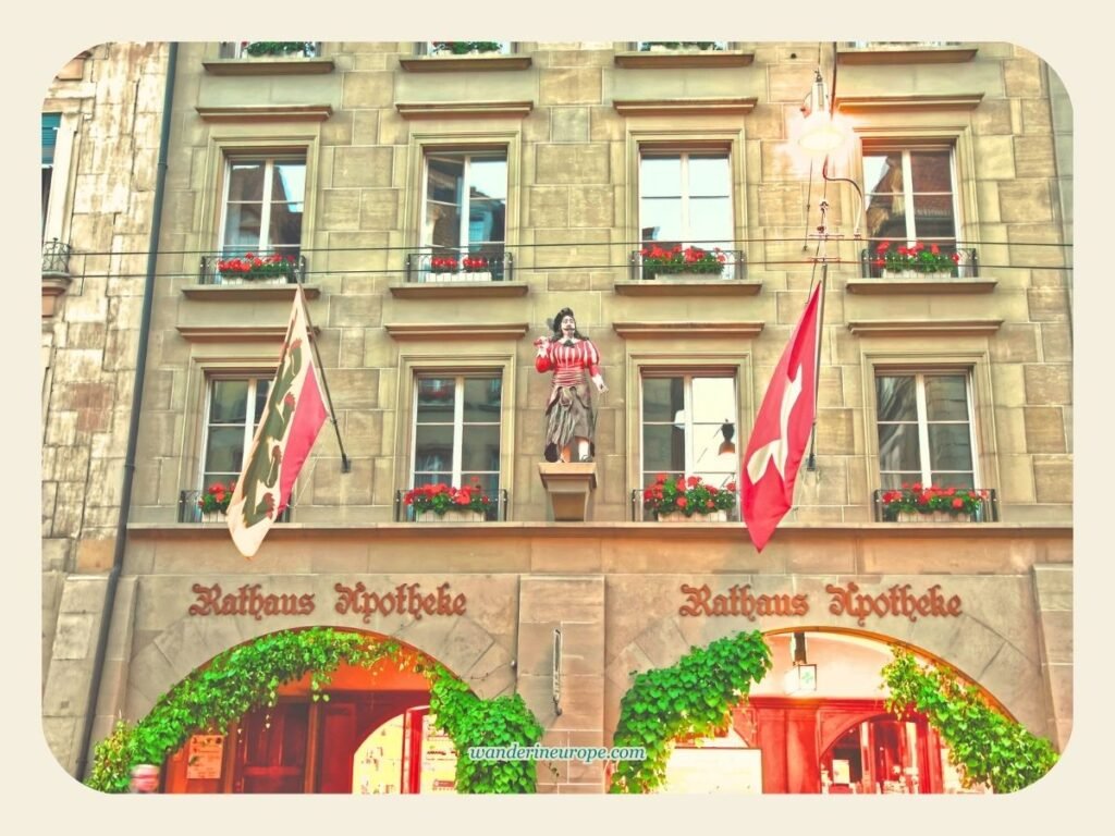 One Day In Bern Itinerary (Visit Landmarks & Scenic Spots) 29 A cute statue attached to the facade of a shop in Kramgasse, Bern, Switzerland