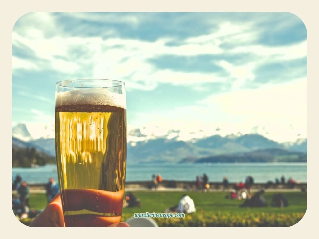 6-Day Switzerland Itinerary: Exploring The Canton of Bern 37 Chillin’ outside Schadau Castle with a view of Lake Thun, Day 3 Switzerland Itinerary