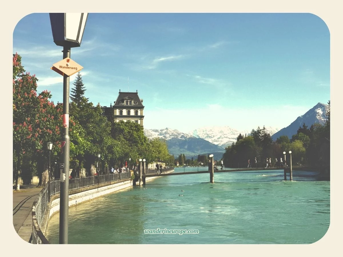 Göttibachsteg and the view of Lake Thun and Bernese Alps in Thun, Switzerland