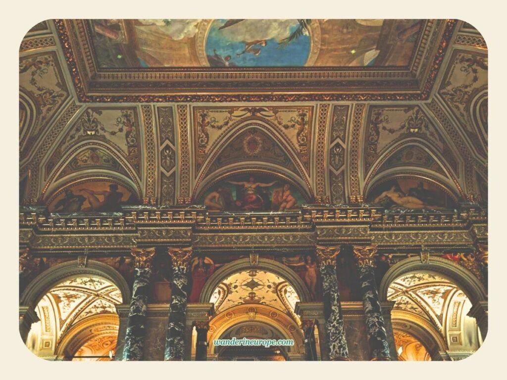 Inside Kunsthistorisches Museum Vienna (10 Epic Artworks) 59 Notice the murals above the intricate beams near the staircase, Kunsthistorisches Museum, Vienna, Austria