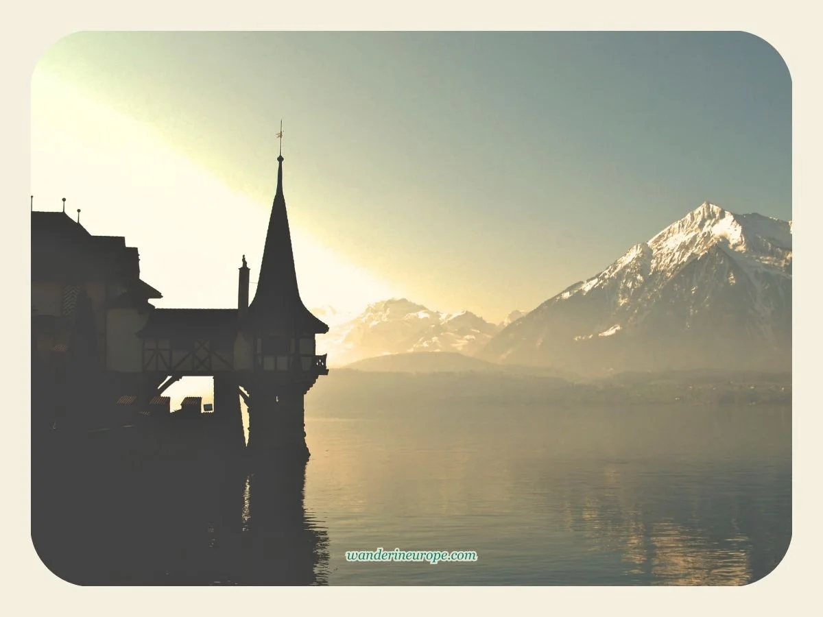 A Guide in Visiting Oberhofen Castle (Expectations + Tips) 2 Oberhofen Castle in front of Bernese Oberland in Thun, Switzerland
