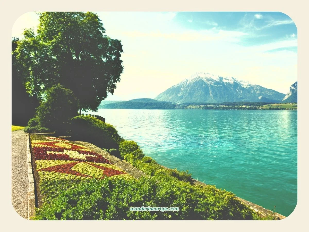 A Guide in Visiting Oberhofen Castle (Expectations + Tips) 15 Oberhofen Castle’s Swiss Cross and views of Lake Thun, Switzerland
