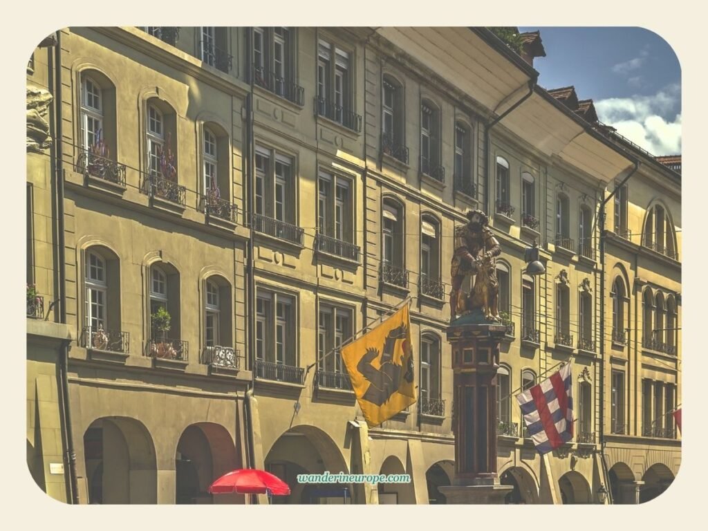 One Day In Bern Itinerary (Visit Landmarks & Scenic Spots) 30 Simsonbrunnen in front of the gorgeous houses in Kramgasse in Bern, Switzerland