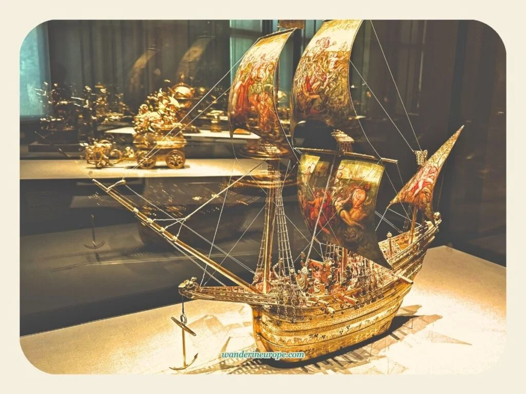 Spectacular golden automatons (in front is the pirate ship with paintings) inside Kunstkammer Wien, Kunsthistorisches Museum, Vienna, Austria