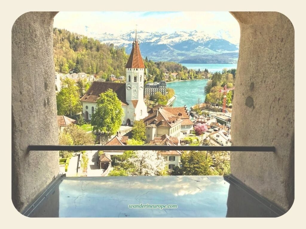 Thun Old Town DIY Walking Tour (with a Map, Route, and Tips) 26 The view of Thun Central Church and the snowy peaks of Bernese Oberland from Thun Castle in Thun, Switzerland
