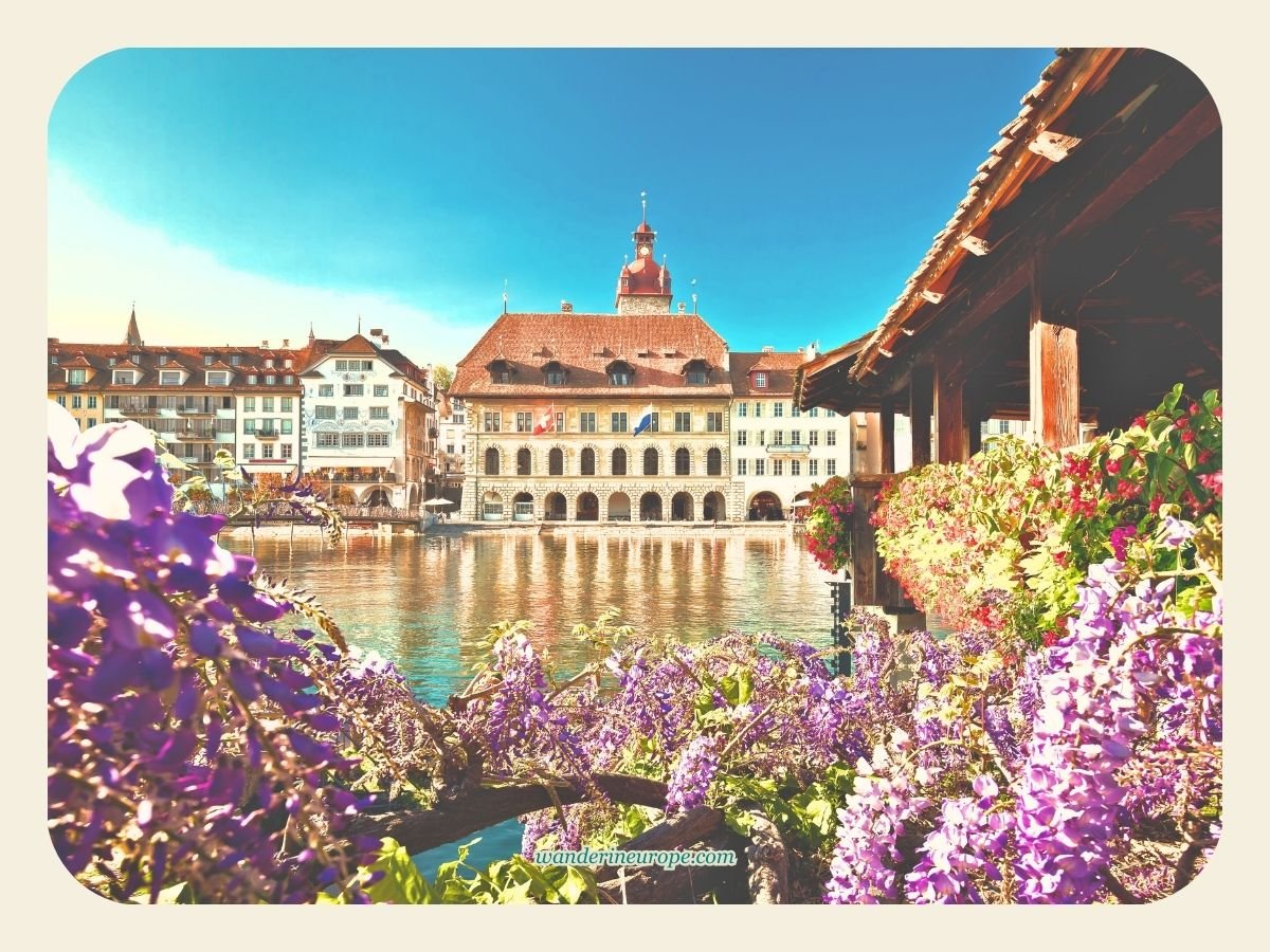 Lucerne 38 The view of the town hall from the Chapel Bridge summertime in Lucerne, Switzerland