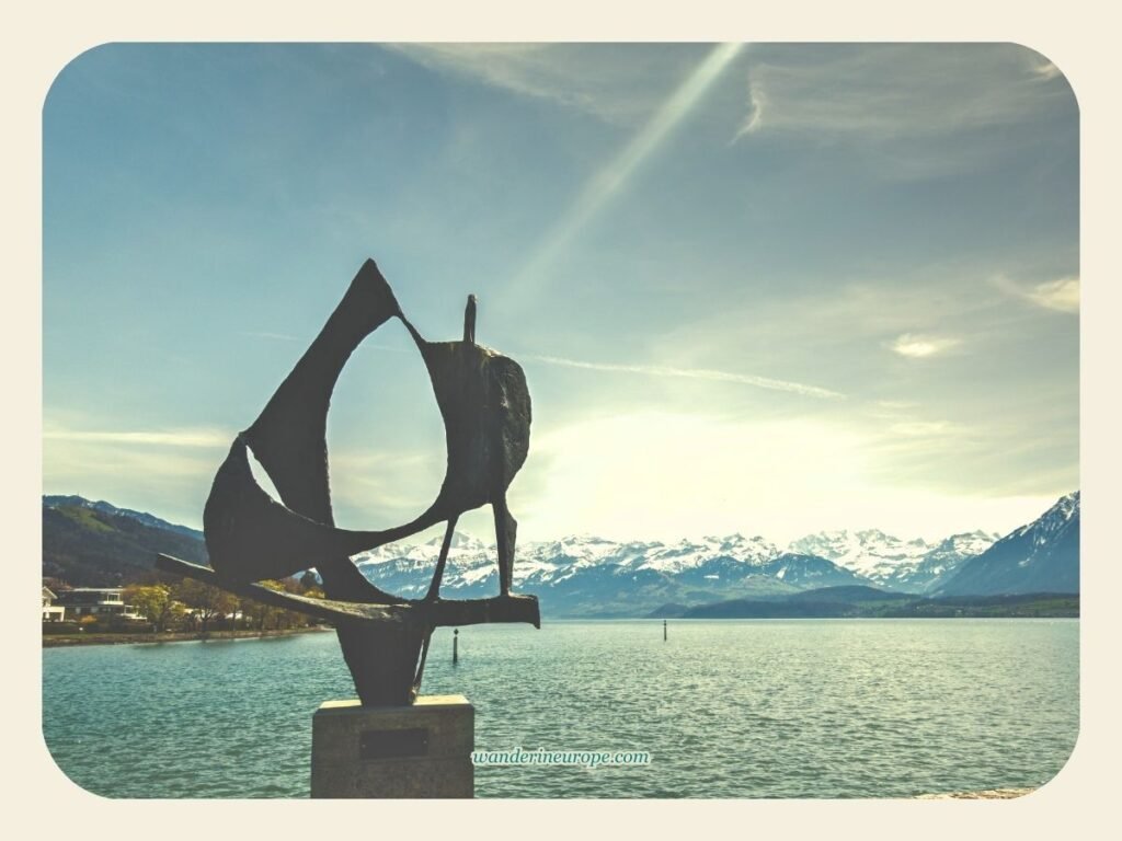 How to Spend One Day in Thun (an Easy Day Trip Itinerary) 28 View from Schadau Park (with a modern sculpture) in Thun, Switzerland