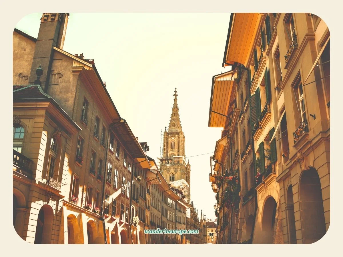 7 Most Beautiful Views In Bern (With Google Maps Links) 4 View of Bern Cathedral from Junkergasse during the golden hour in Bern, Switzerland