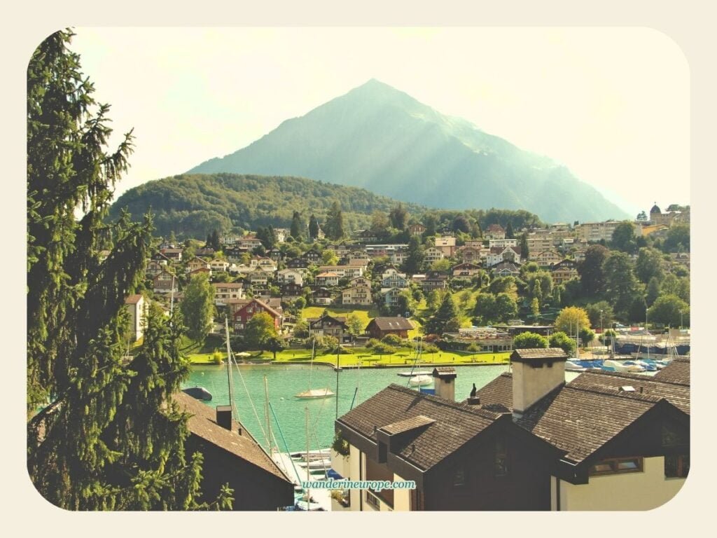 One Day Lake Thun Itinerary Sightseeing + Visiting Castles 31 View of Mount Niesen from Spiez beside Lake Thun, Switzerland