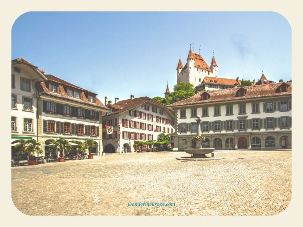 Thun Old Town DIY Walking Tour (with a Map, Route, and Tips) 33 View of the Thun Castle overlooking the Old Town, seen from Rathausplatz in Thun, Switzerland
