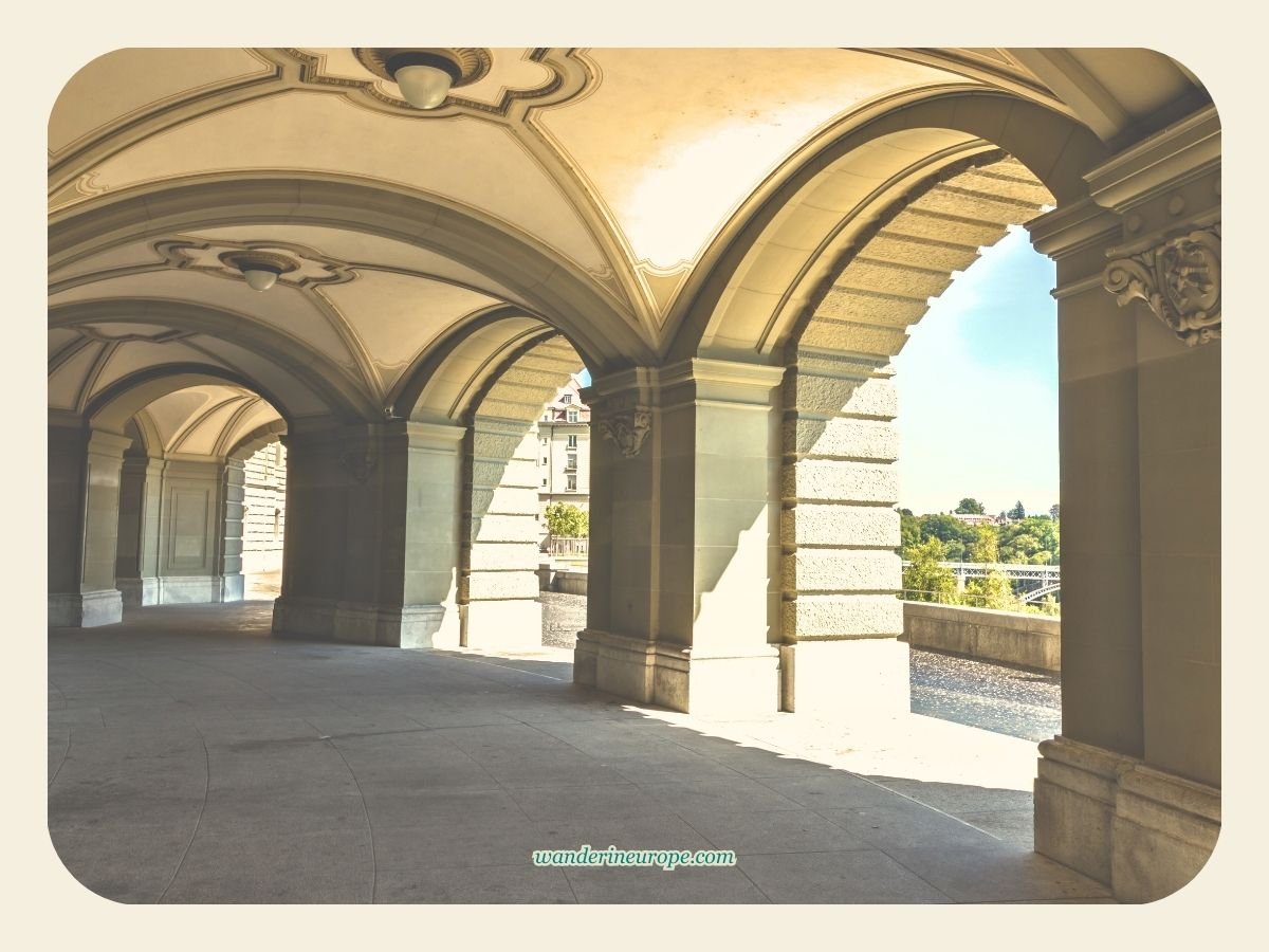 Visiting Bundeshaus In Bern: What To See Inside and Outside 4 Wandehalle's arcades of Bundeshaus along Bundesterrasse in Bern, Switzerland