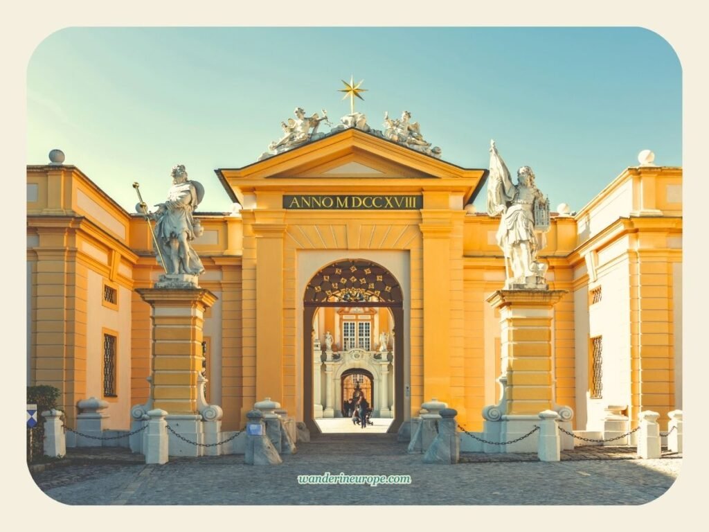 A Guide to Melk Abbey (a Beautiful Day Trip from Vienna) 45 Golden hour at the gate of Melk Abbey, day trip destination from Vienna, Austria