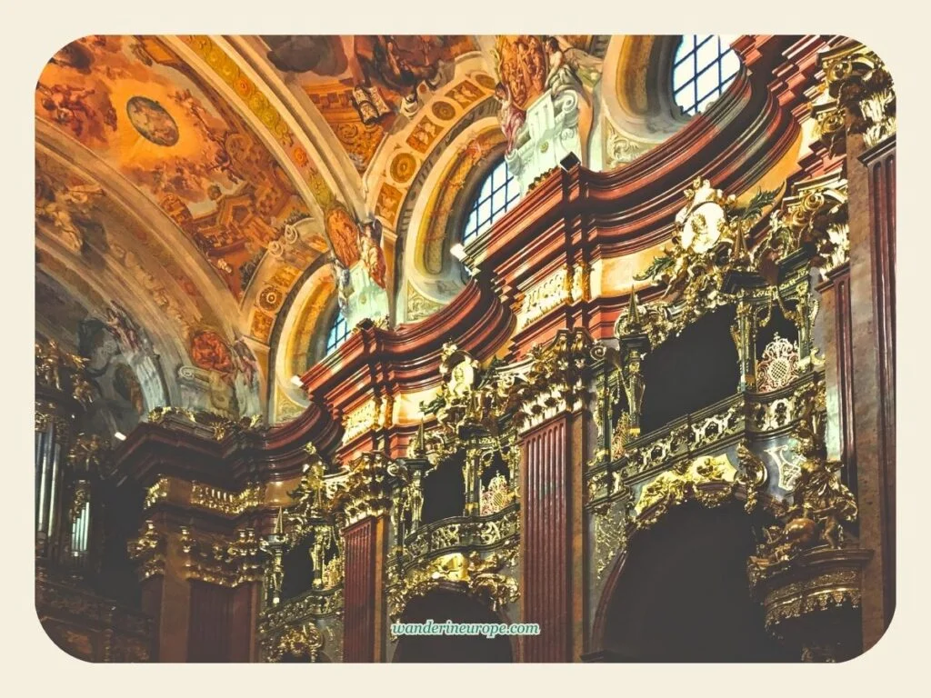 A Guide to Melk Abbey (a Beautiful Day Trip from Vienna) 31 Heavily adorned walls of the church of Melk Abbey, a must see place from Vienna, Austria