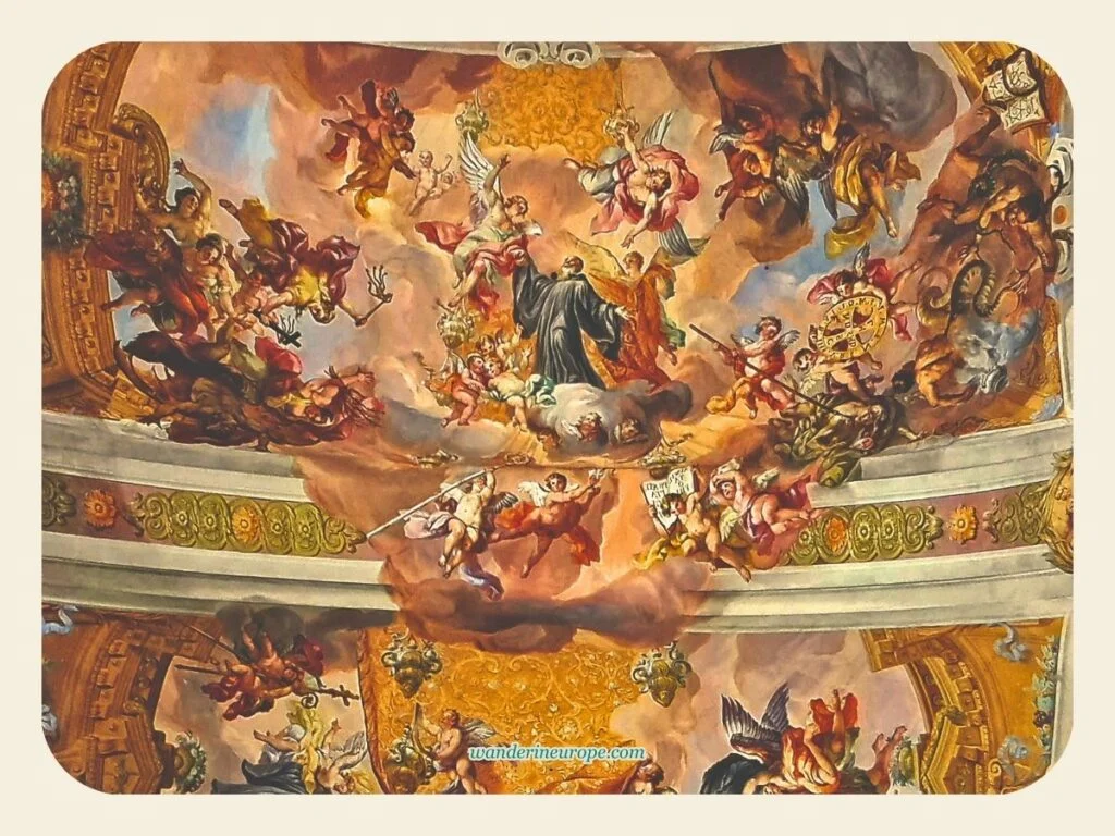 A Guide to Melk Abbey (a Beautiful Day Trip from Vienna) 30 Saints and angels depicted in the frescoes of the church of Melk Abbey, a destination to visit from Vienna, Austria