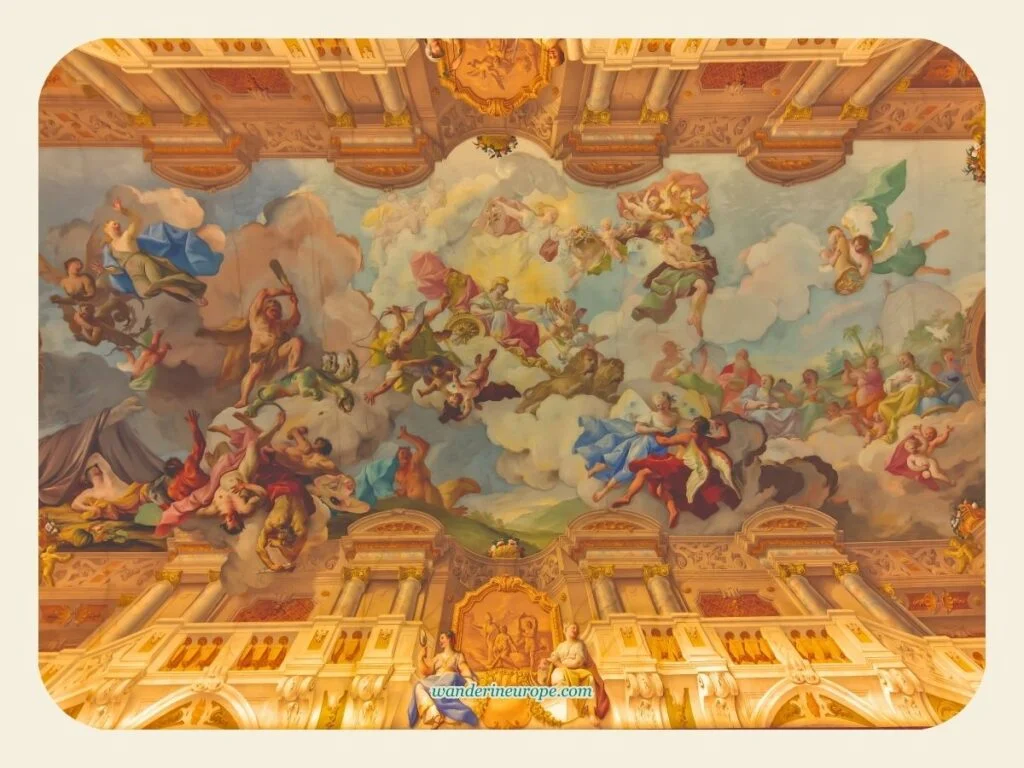 A Guide to Melk Abbey (a Beautiful Day Trip from Vienna) 25 The giant fresco of the Marble Hall, a beautiful artwork inside the Melk Abbey, a must visit destination from Vienna, Austria