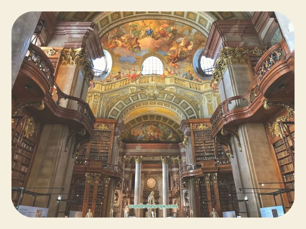 Vienna’s Interiors: A Wanderer’s Guide to Must-See Artworks 18 Austrian National Library interiors with the view of the Apotheosis of Charles VI, Vienna, Austria
