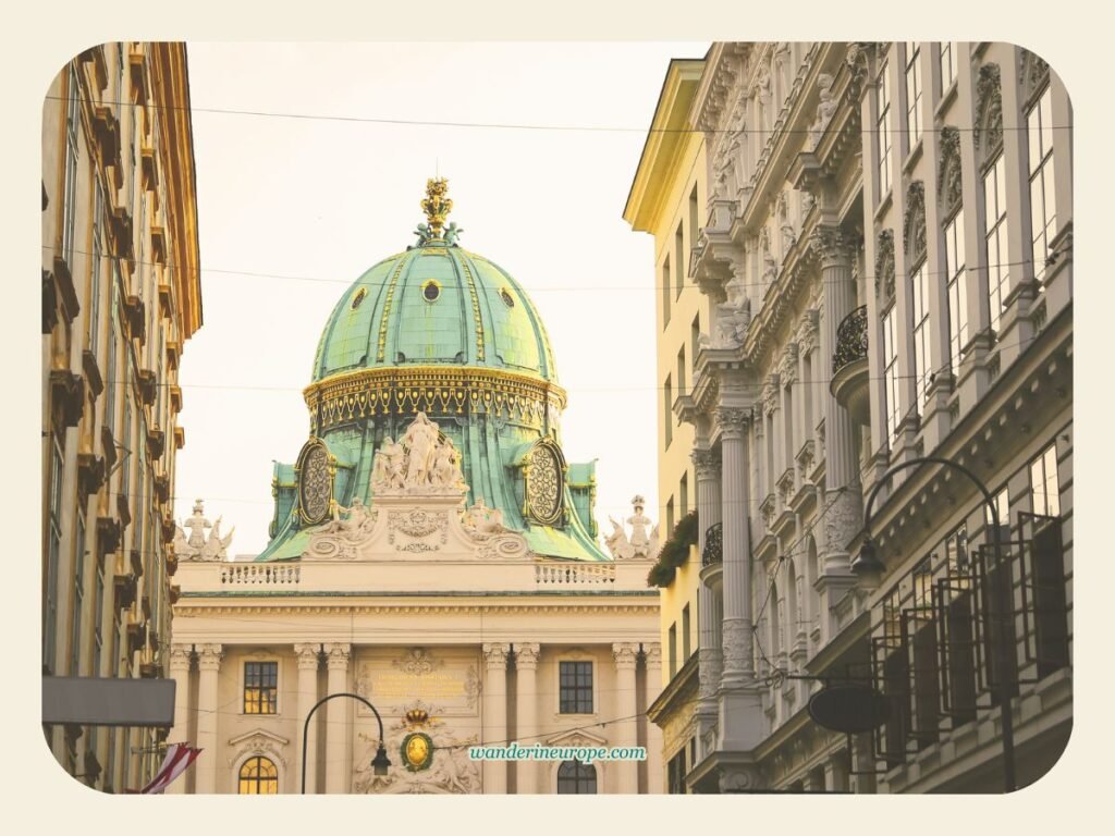 Vienna One-Day Budget Itinerary: Sightseeing Top Attractions 18 Zoomed in shot of Hofburg along Kohlmarkt — this one is during the Golden hour in Vienna, Austria