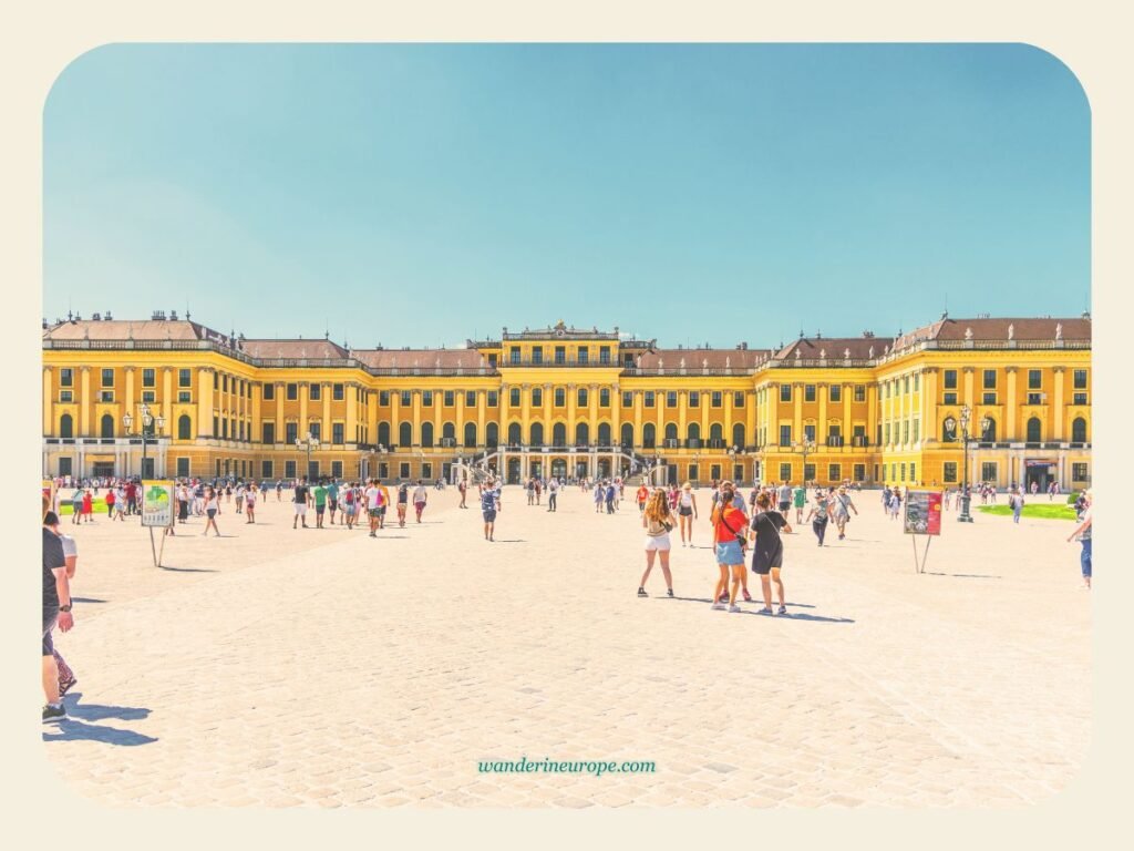 2-Day Vienna Itinerary: Visiting the Highlights & Viewpoints 40 The facade of Schonbrunn Palace from its courtyard near the train station, fifth destination — day 2 of 2 in Vienna, Austria