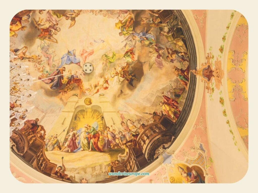 Oberammergau's Architectural Gem: St. Peter and Paul Church 5 A close up shot of the central fresco of the Church of Saint Peter and Paul in Oberammergau, Germany