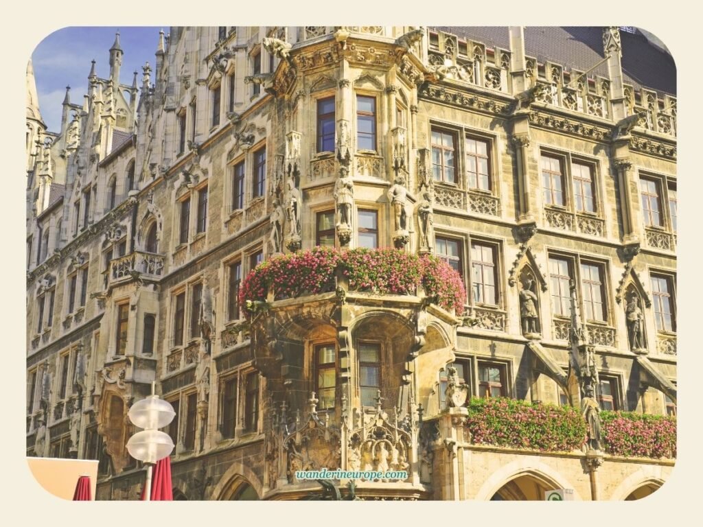 10 Beautiful Places in Munich for First-Timers and Explorers 18 Flowers adorning the facade of Neues Rathaus, Marienplatz, Munich, Germany
