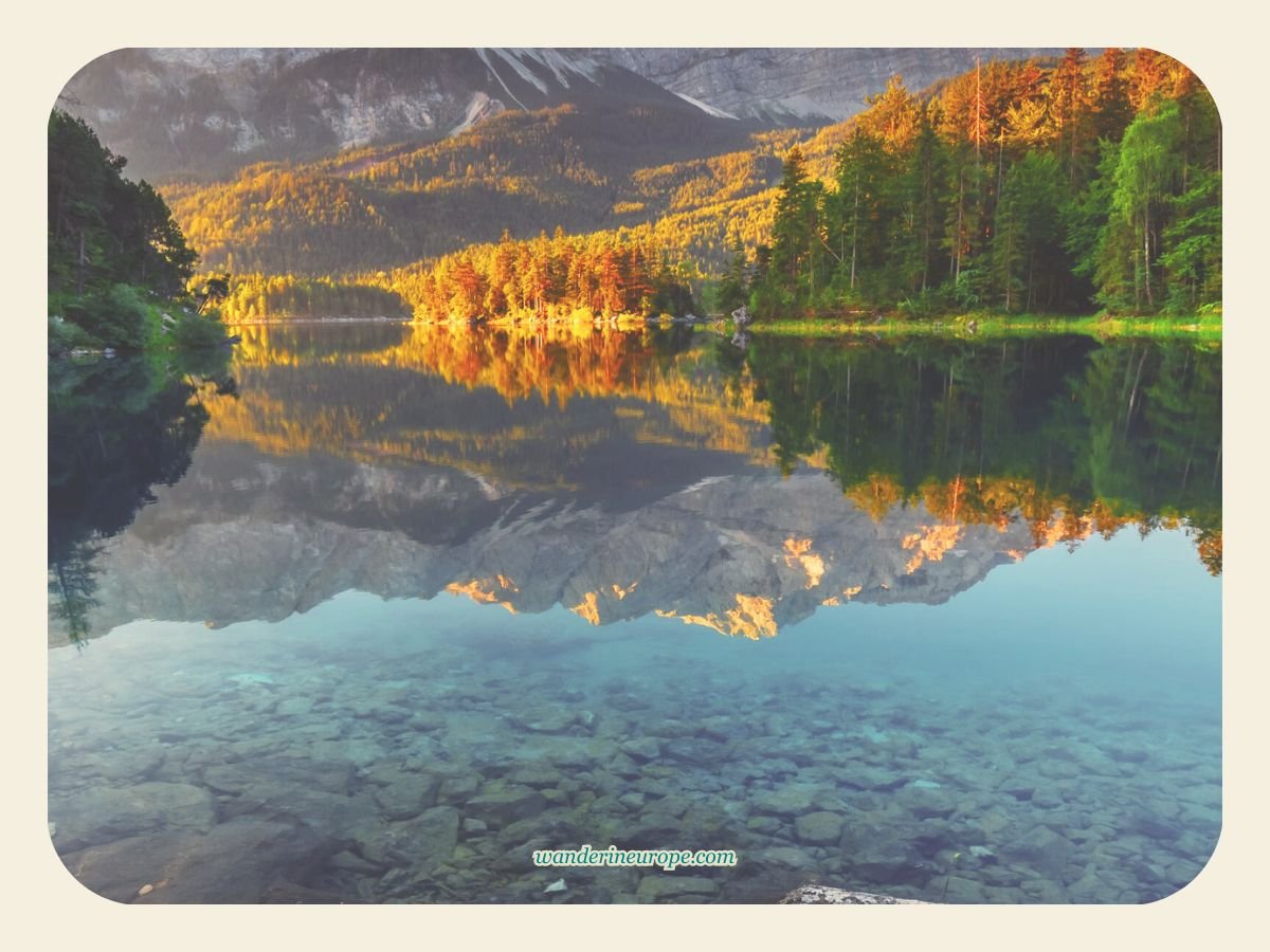 Upper Bavaria 50 Golden hour reflections on the surface of Eibsee near Garmisch-Partenkirchen, Germany