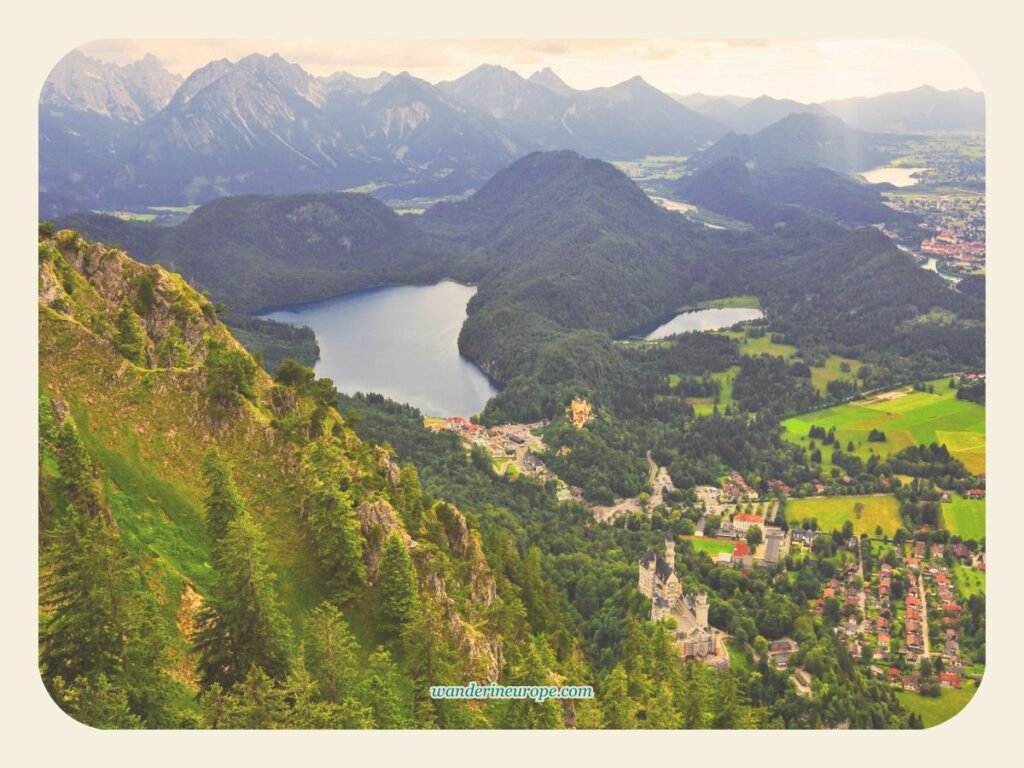 Neuschwanstein Castle Viewpoints and Photography Spots 10 Higher view of Neuschwanstein Castle from the hiking trail to Tegelberg, Schwangau, Germany
