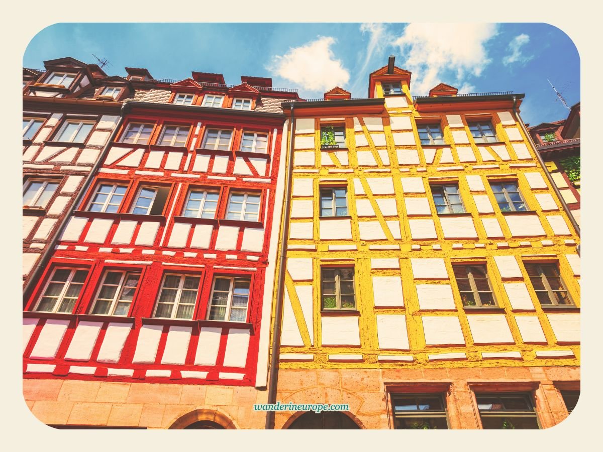 Explore the Streets of Nuremberg: Photo Spots & Hidden Gems 4 Red and yellow timber framed house along Weissgerbergasse, Nuremberg, Germany