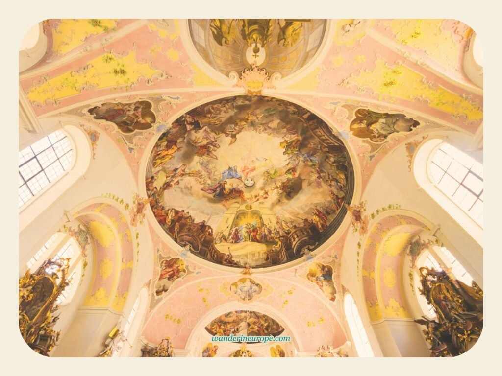 The central fresco along the nave of the Church of Saint Peter and Paul in Oberammergau, Germany