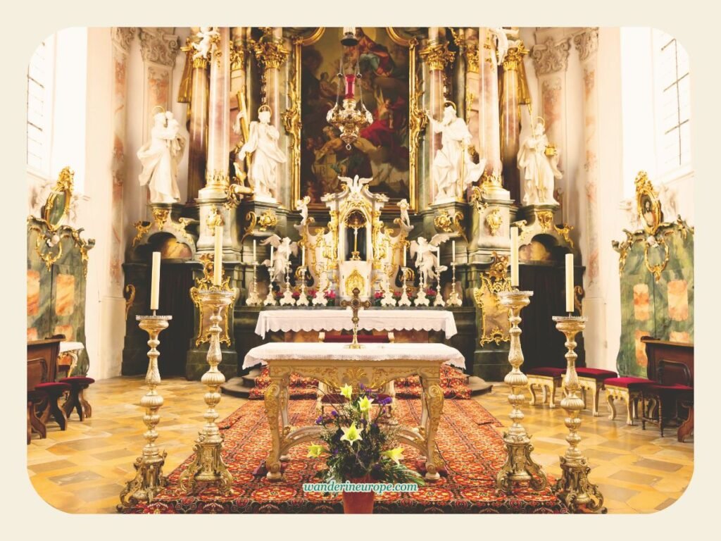 Oberammergau's Architectural Gem: St. Peter and Paul Church 7 The high altar of the Church of Saint Peter and Paul in Oberammergau, Germany