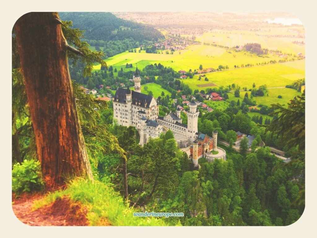 Unique view of Neuschwanstein Castle from the hiking trail to Tegelberg, Schwangau, Germany