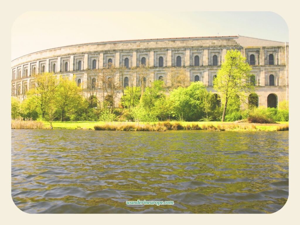 A Quick Guide to Discovering Nuremberg’s Amazing Experiences 25 View of Kongresshalle while riding the boat on Grosser Dutzendteich Lake, Nuremberg, Germany