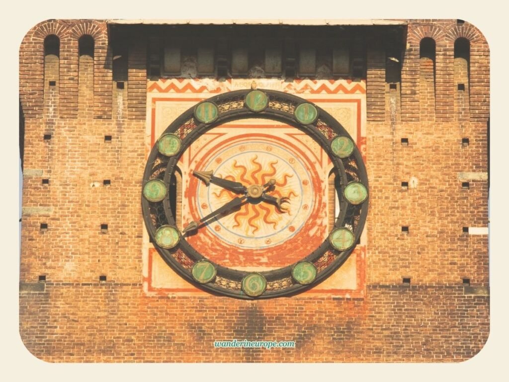 The Ultimate Explorer’s Guide to a Well-Rounded Milan Trip 25 A beautiful clock on the wall of Castello Sforzesco, Milan, Italy