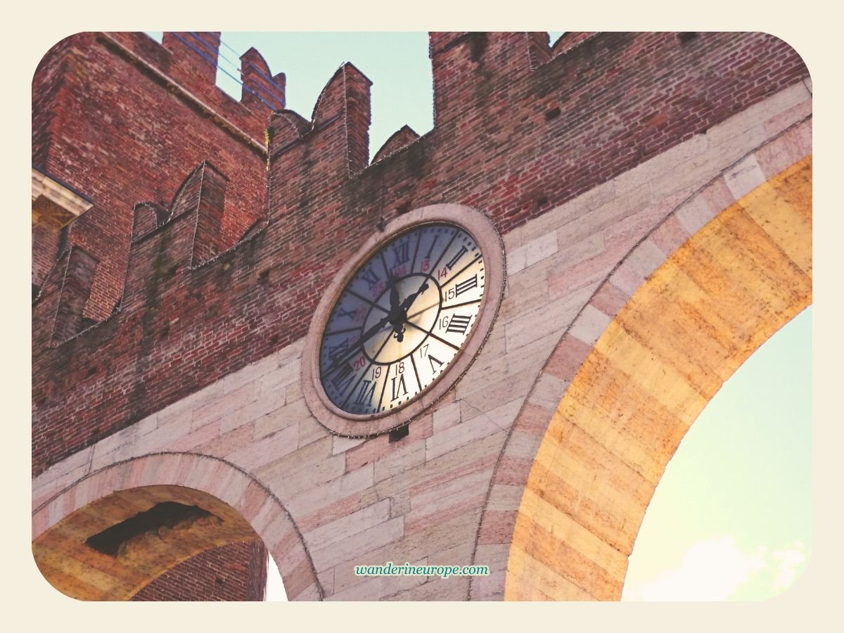 Four Great Ways to Enjoy a One-Day Visit to Verona 4 Beautiful clock at the merlon arches of Verona, Italy