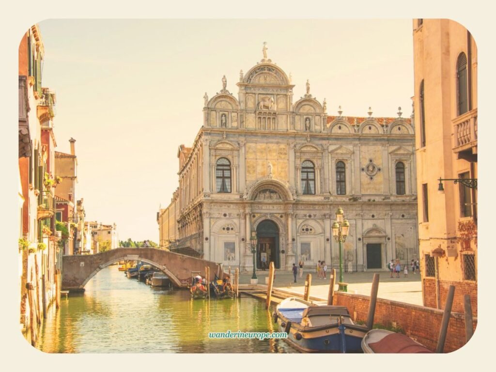 Architecture Lover's Guide: 10 Beautiful Buildings in Venice 58 Boat view of Scuola Grande di San Marco, Venice, Italy