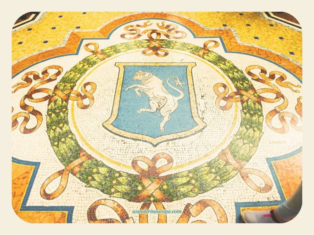 The Ultimate Explorer’s Guide to a Well-Rounded Milan Trip 46 Coat of arms mosaic in Galleria Vittorio Emanuele II, Milan, Italy