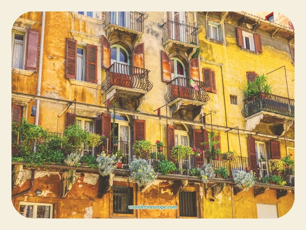 A Guide to Discovering Verona: Its Beauty, History & Romance 44 Colorful houses in Piazza Erbe, Citta Antica, one of the must-see architectural attractions in Verona, Italy