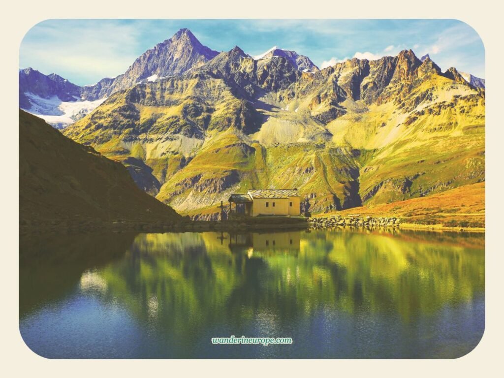 Inverted image of Maria zum Schnee chapel over Schwarzsee, Zermatt, Switzerland